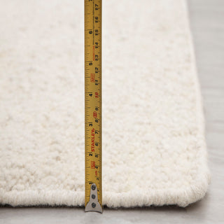 Ivory Minimal Handwoven Wool Rug – Elegant Modern Carpet